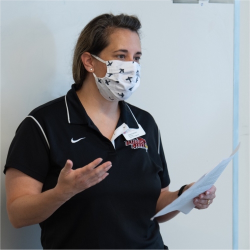 Instructor in class with a mask
